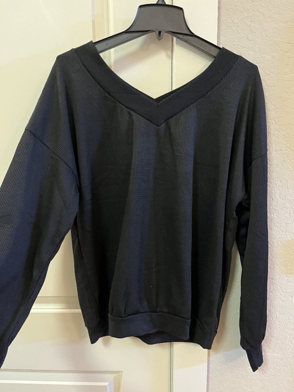 Purchased on Amazon Unbranded Women's Black Double V-Neck Sweater Shirt Top